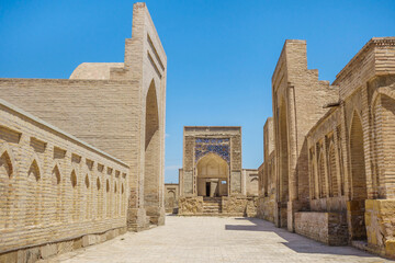 Fototapeta na wymiar Panorama of medieval mausoleums in the Chor-Bakr memorial complex, Bukhara, Uzbekistan. Building in the center is Oyposhshooyim vault