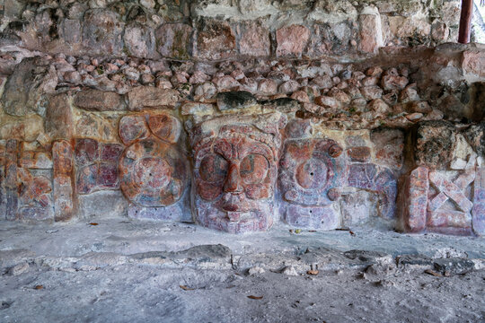 Mayan city Edzna - stucco mask of the Sun God, Kinich Ahau, in the temple of the masks, Campeche, Yucatan peninsula, Mexico