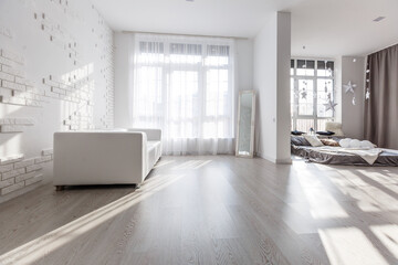 Spacious and bright living room with stylish decorations.