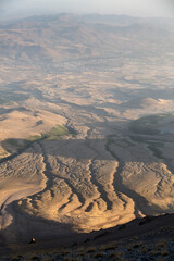 Panorama view from the Mount Ergies at the valley and the bed of dried up rivers during sunset, Kayseri, Turkey