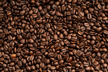 Fototapeta premium Roasted coffee beans macro close up view