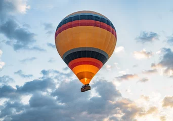 Closeup view of flying colorful hot air balloon at sunrise © efired