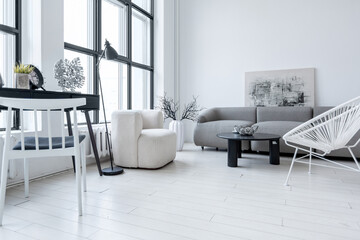 Fototapeta na wymiar modern minimalistic interior design of light bright monochrome room with black and white furniture, clean white walls and huge windows