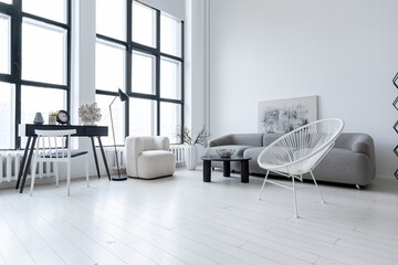 modern minimalistic interior design of light bright monochrome room with black and white furniture, clean white walls and huge windows
