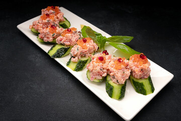 Appetizer with salmon and red caviar