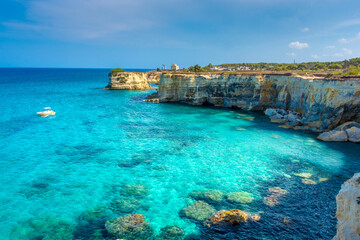 SALENTO, ITALY, 11 AUGUST 2021 The beautiful crystal clear Sea of Apulia from the cliffs and the...