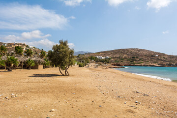 Koumbara beach with golden sand and white pebbles on Ios Island. Greece