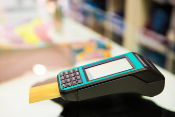 Credit card reader. Payment terminal. POS terminal. Mobile device for paying with bank cards.