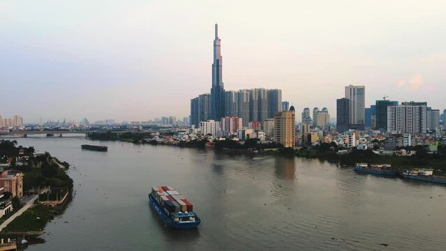 Drone hyperlapse over the river to Landmark 81, Ho Chi Minh City, Vietnam
