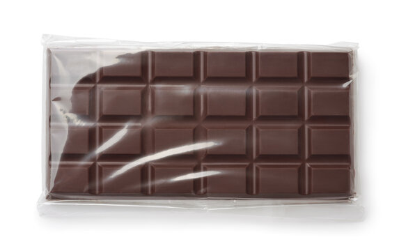 Top view of dark chocolate in transparent plastic packaging