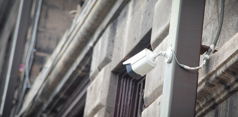 CCTV security camera at the wall.