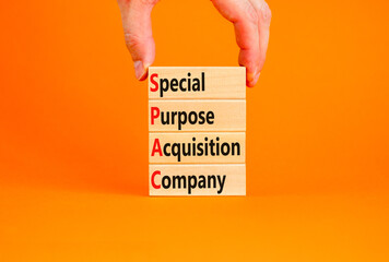 SPAC special purpose acquisition company symbol. Concept words SPAC special purpose acquisition company on beautiful orange background. Business SPAC special purpose acquisition company concept.