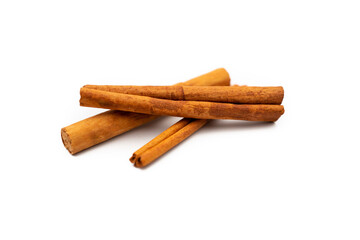 3 cinnamon sticks on a white background