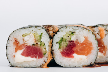 sushi rolls fish on a white background. restaurant menu
