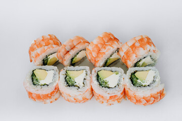 sushi rolls fish on a white background. restaurant menu