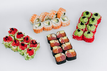 sushi rolls fish on a white background. restaurant menu