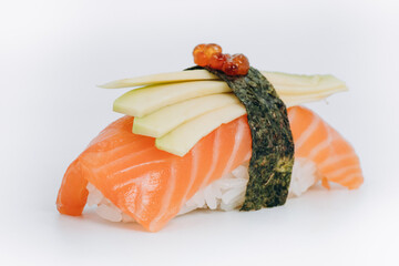 Gunkans with salmon and avocado on a white background