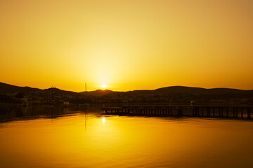 Sunset at sea. Sea landscape, variety of colors and hues of the rising sun. 