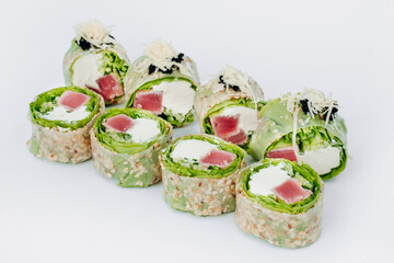 sushi rolls in lettuce with tuna salmon and cheese on a white background. restaurant menu.