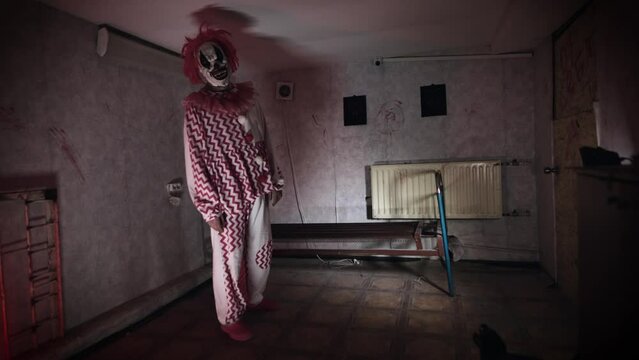A scary clown with supernatural abilities, has the ability to telekinesis. A poltergeist moves a bed in an abandoned ward.