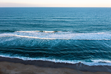 Fototapeta premium Aerial View of the Atlantic Ocean looking out to sea in the Outer Banks