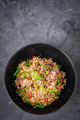 traditional chinese fried rice on black background