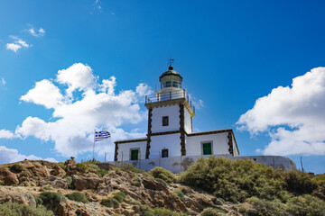 Fototapeta na wymiar Akrotiri lighthouse (φάρος στο Ακρωτήρι) Akrotiri Lighthouse is a 19th-century lighthouse on the Greek island of Santorini