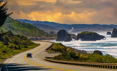 Fotobehang US Highway 101 and ocean sea stacks near the town of Gold Beach on the Oregon coast © Bob