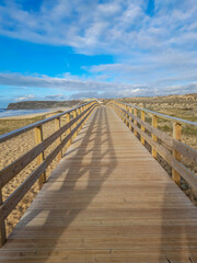 Fototapeta na wymiar boardwalk through the sand dunes