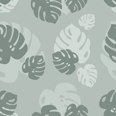 Fototapeta na wymiar Tropical seamless pattern from monstera leaves. Stylish summer texture. Background from green tropical leaves with transparency and overlay. Spring jungle print from tropics. Monstera fabric, textile.