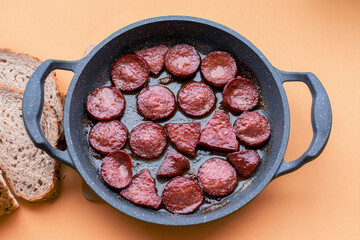 Deep-fried beef sausage in a pan. type of meat used in Turkish breakfasts