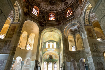 Interior of the Basilica of San Vitale in Ravenna, with natural light giving a golden touch.
