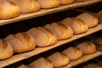Fresh pastries close-up. Bakery products. Fresh bread close up. Loaves of bread on the shelves.