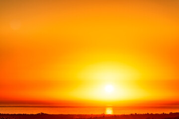 Yellow sunset, sunrise over horizon, ocean