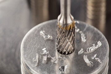 Milling сutter and drill bit make sink in hole in steel billet. Locksmith work.