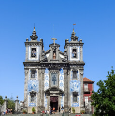 Porto, Portugal - July 30 2019:  Sao Idelfonso Church, decorated with Portugueses azulejos (traditional blue tiles)