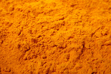 Aromatic saffron powder as background, closeup view