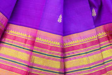 Purple silk sari with gold floral design border