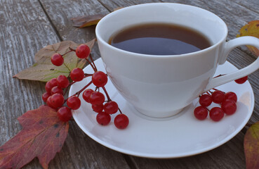 cup of coffee and red rose