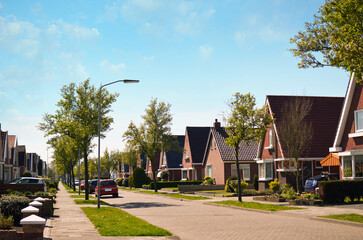 Block of houses on sunny day. Suburban district