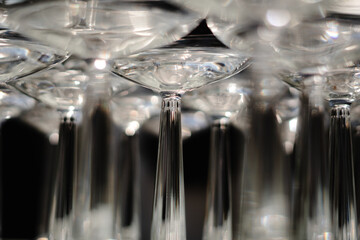 row set of empty wineglasses in restaurant bar