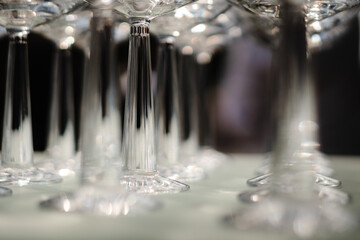 row set of empty wineglasses in restaurant bar