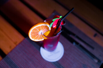 Close-up of a red cocktail on the table
