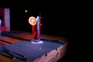 Close-up of a red cocktail on the table