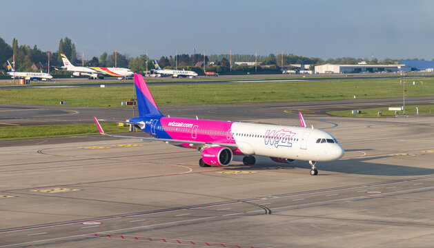 Charleroi, Belgium - April 22, 2022: A picture of a Wizz Air plane taxiing at the Charleroi Airport.