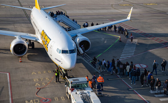 Charleroi, Belgium - April 22, 2022: A picture of a Buzz (part of the Ryanair group) plane being boarded near the terminal at the Charleroi Airport.