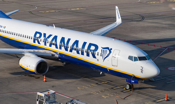 Charleroi, Belgium - April 22, 2022: A picture of a Ryanair plane parked near the terminal at the Charleroi Airport.