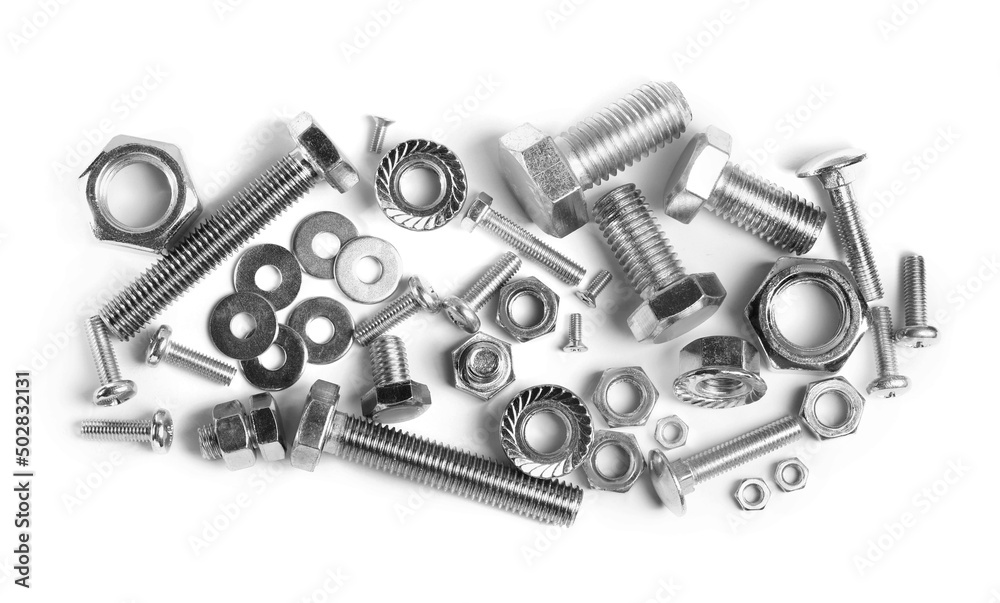 Wall mural Different metal bolts and nuts on white background, top view