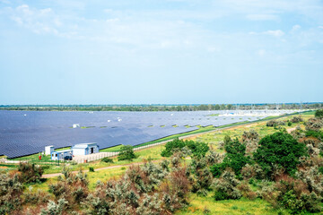 Panoramic view of photovoltaic power station, solar park, solar farm, solar power plant. Banner with modern solar farm