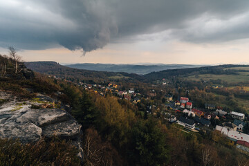 A view of village of Tisá, Elbe sandstone rock formations, Czech Switzerland. Stormy weather over sandstone rocks in Tisá, Czech republic.